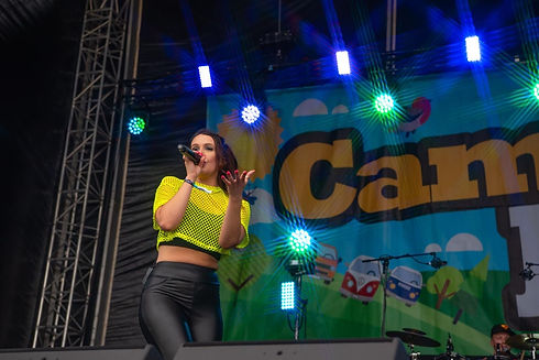 Noughty Nineties performing energetic 90s and 00s party set at a festival.