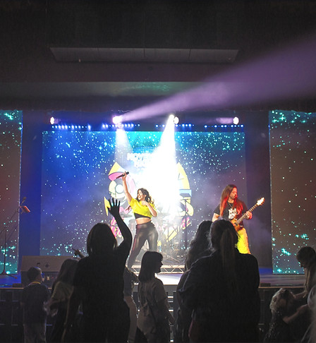 Noughty Nineties performing energetic 90s and 00s party set at a corporate event