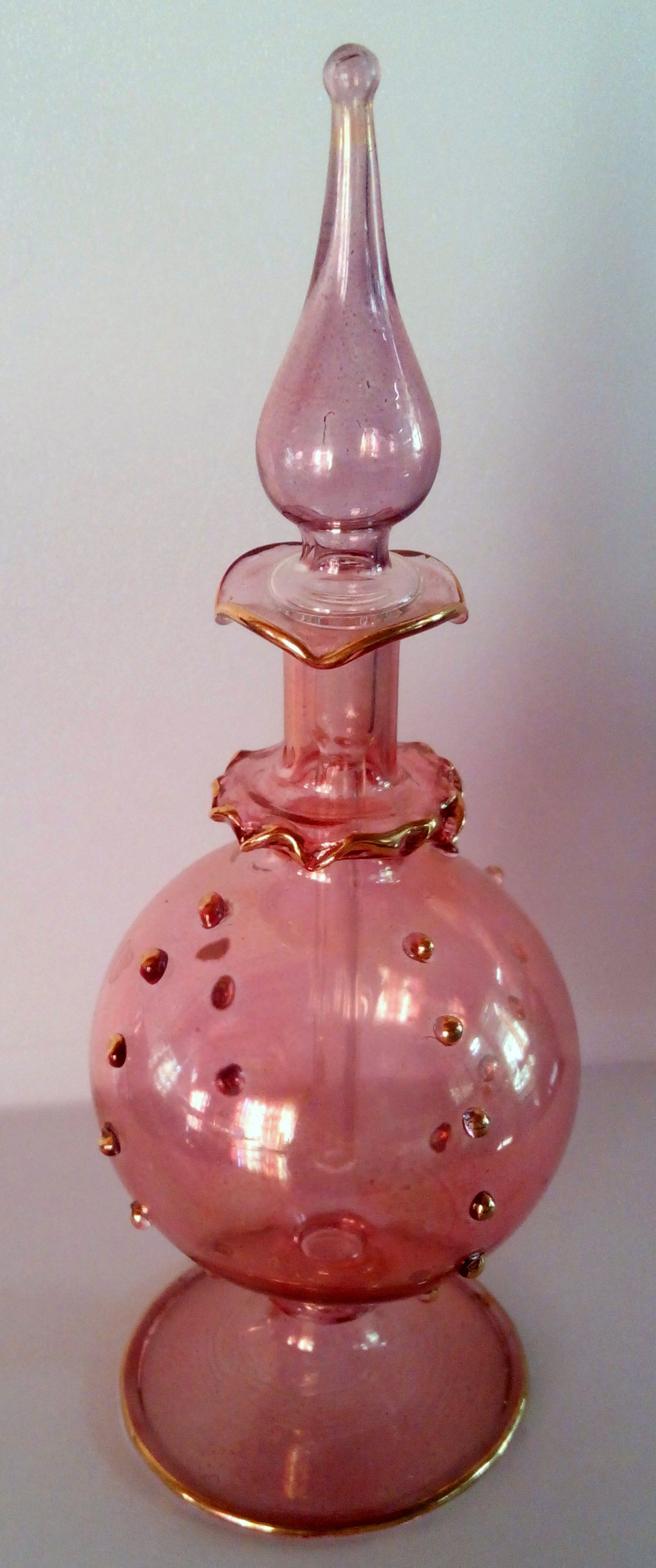Blown fine pink glass perfume bottle