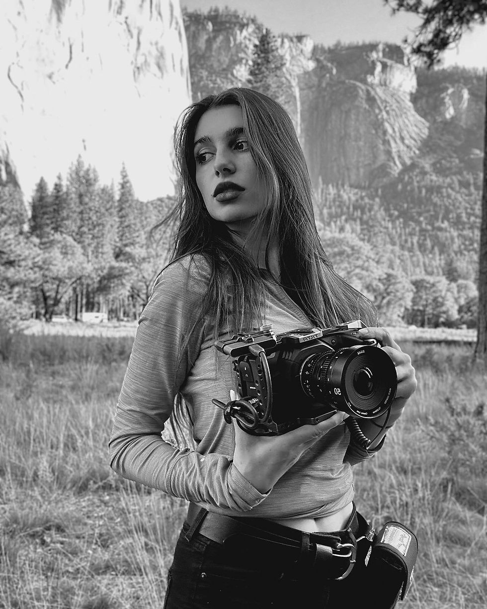Gabriella Rose Korte holds her BMPCC 4k in front of El Capitan in Yosemite National Park 