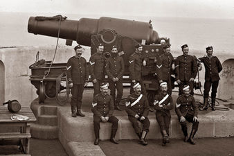 New South Wales Permanent Artillery with Fort Scratchley's nine inch gun, Circa 1882 -1892. NOTE: Some of the men are wearing the hat badge of the NSW Permanent Artillery. PICTURE CREDIT: University of Newcastle, REF: ASGN1007-B42.