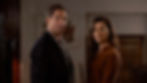Man and woman stare