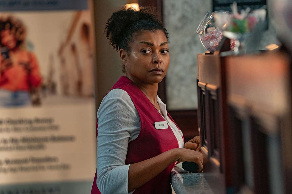 A woman in a red vest stands behind a counter, looking serious. A blurred poster and peppermint jar are in the background. Name tag visible.