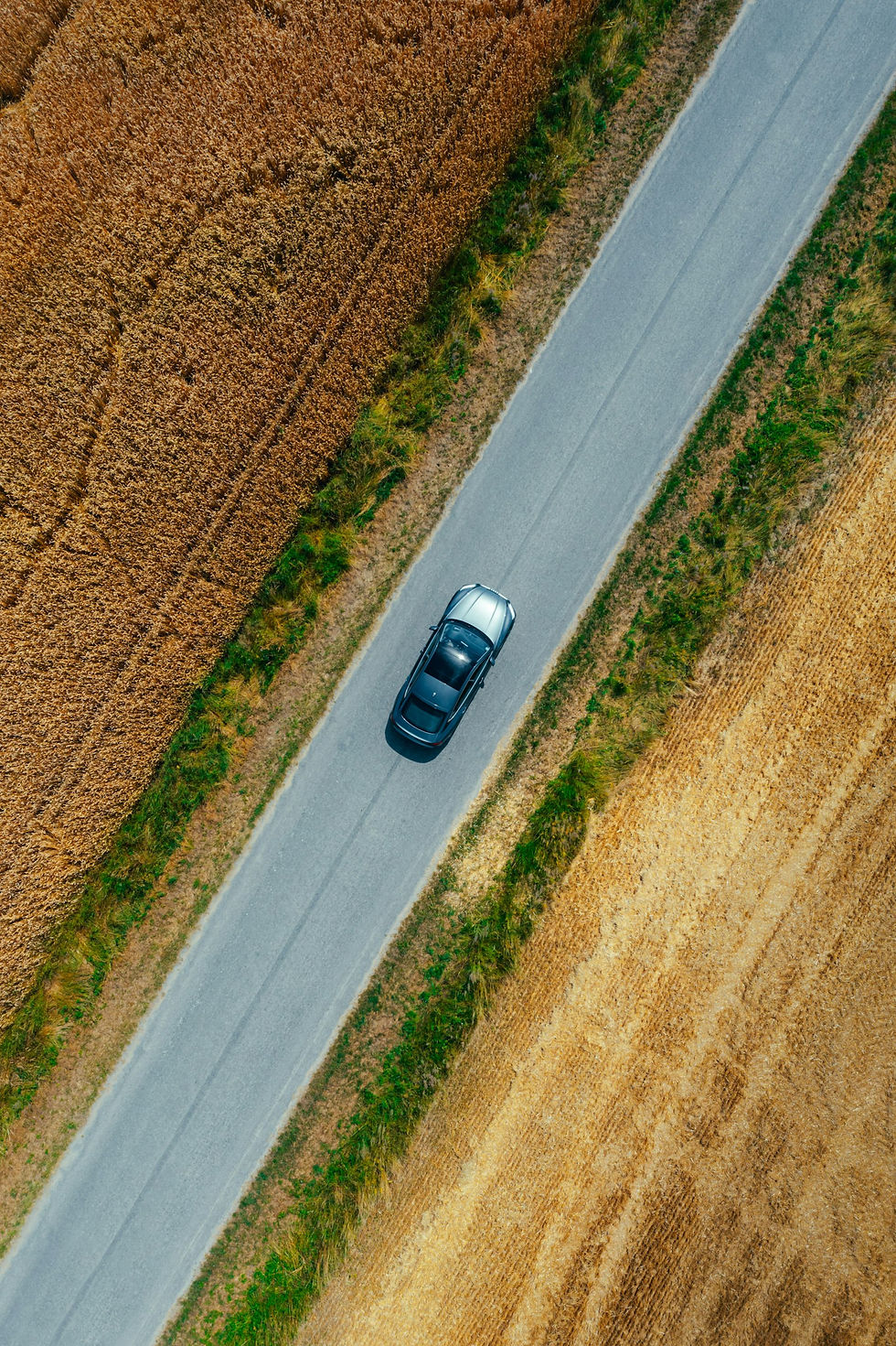 A car travelling along a quiet country road