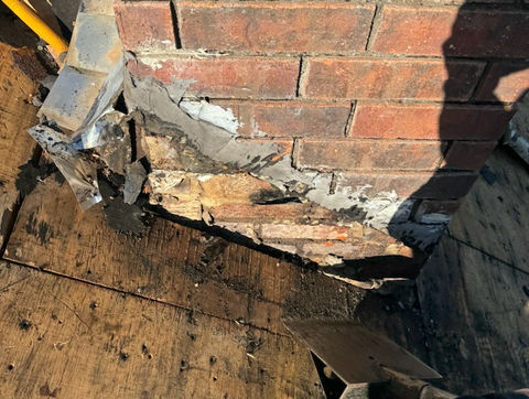 Chimney flashing roof repair