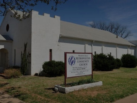 The welcoming exterior of Wichita Falls Metropolitan Community Church in warm natural light