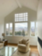 White Interior with Large Windows in Park City Looking at Snow Covered Trails