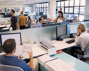 People Working in Open Office