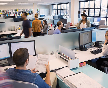 People Working in Open Office