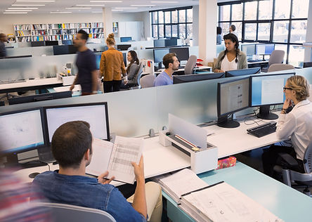 Xspor Australia - People Working in Open Office