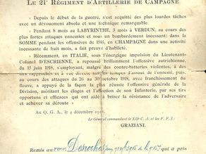 Ordre militaire n°44, texte en noir détaillant exploits du 21e Régiment d'Artillerie en 1918. Tampon violet et signature manuscrite bleue.