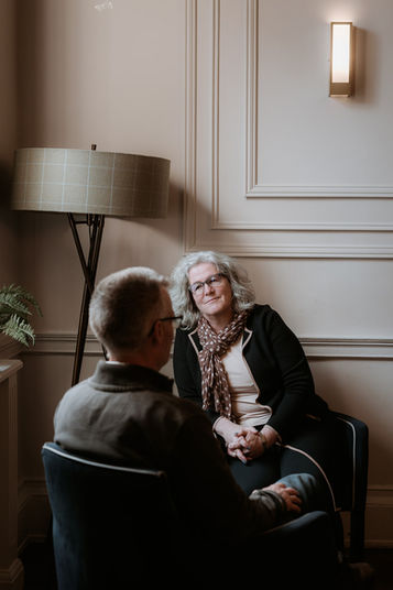Catrina Young, Independent ,Heart-led celebrant in conversation with a man facing the opposite way.