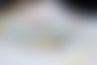 "We're getting married" card resting on a desk suggesting planning