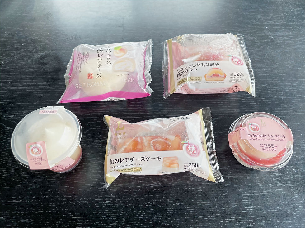 The peach flavored desserts from Lawson on a black table.