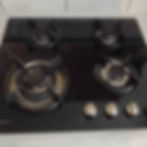 after Black gas stovetop with four burners
