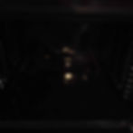 Dark oven interior with a light source