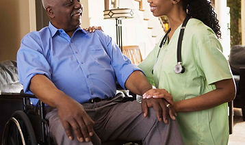 Caregiver Assisting Man