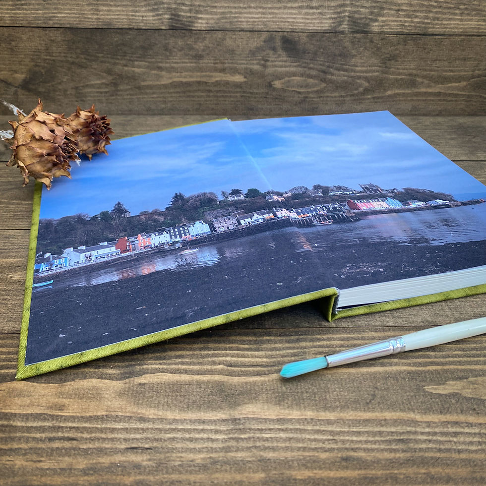 A handmade sketchbook with Tobermory photographic endpapers