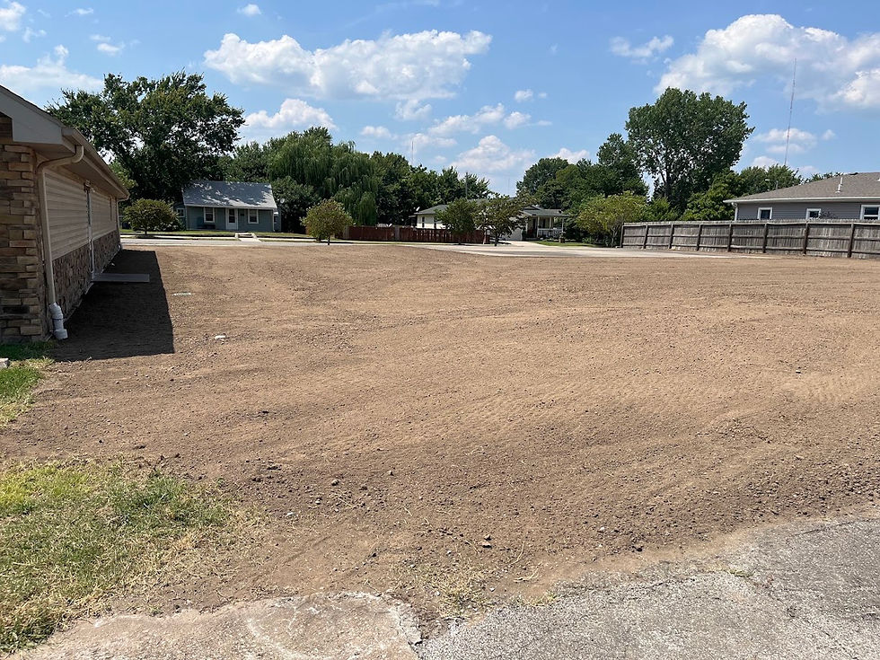Finished Grading and Topsoil After Commercial Drainage Project