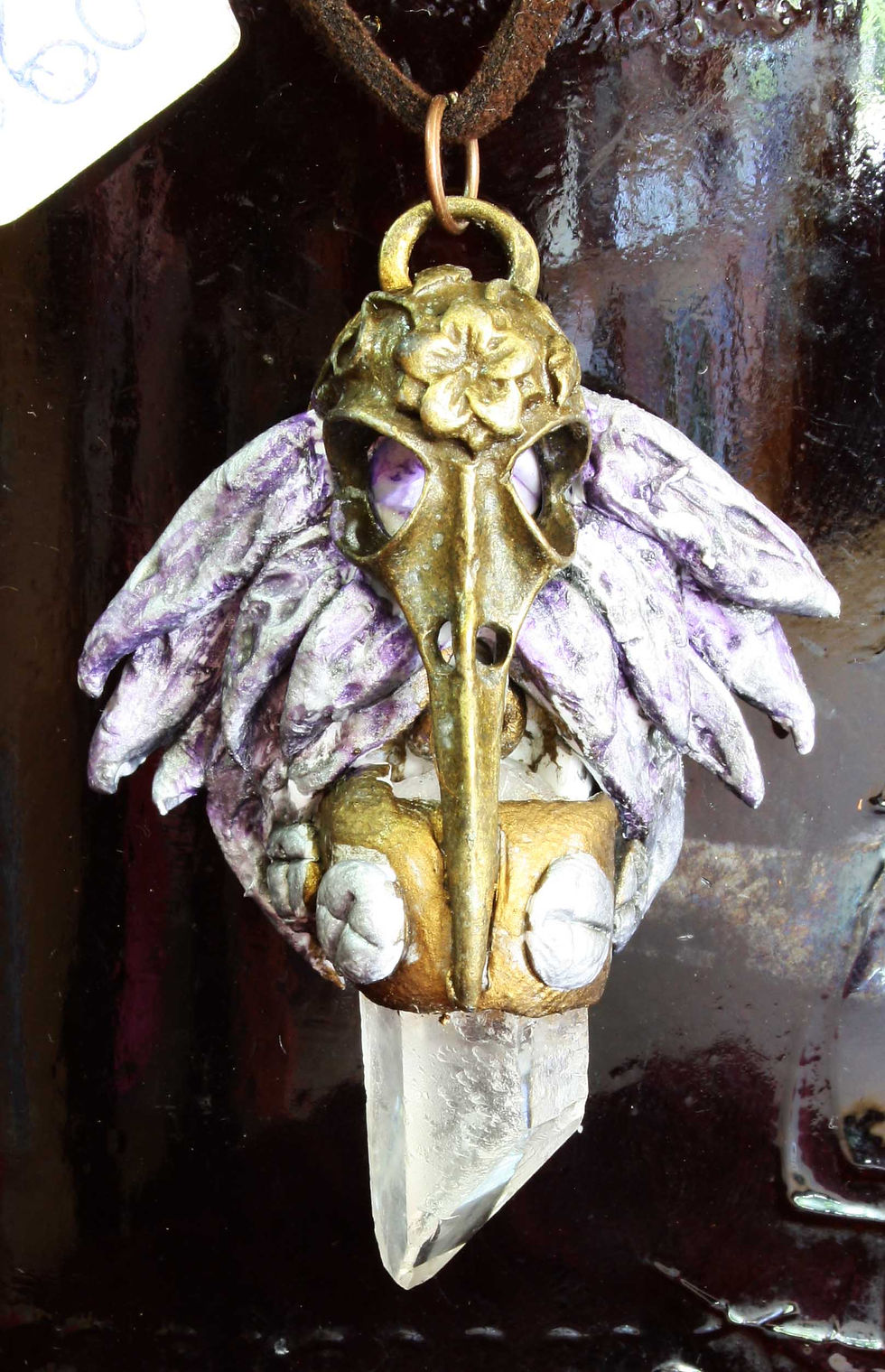 Thumbnail: Steampunk  bird winged skull quartz crystal point