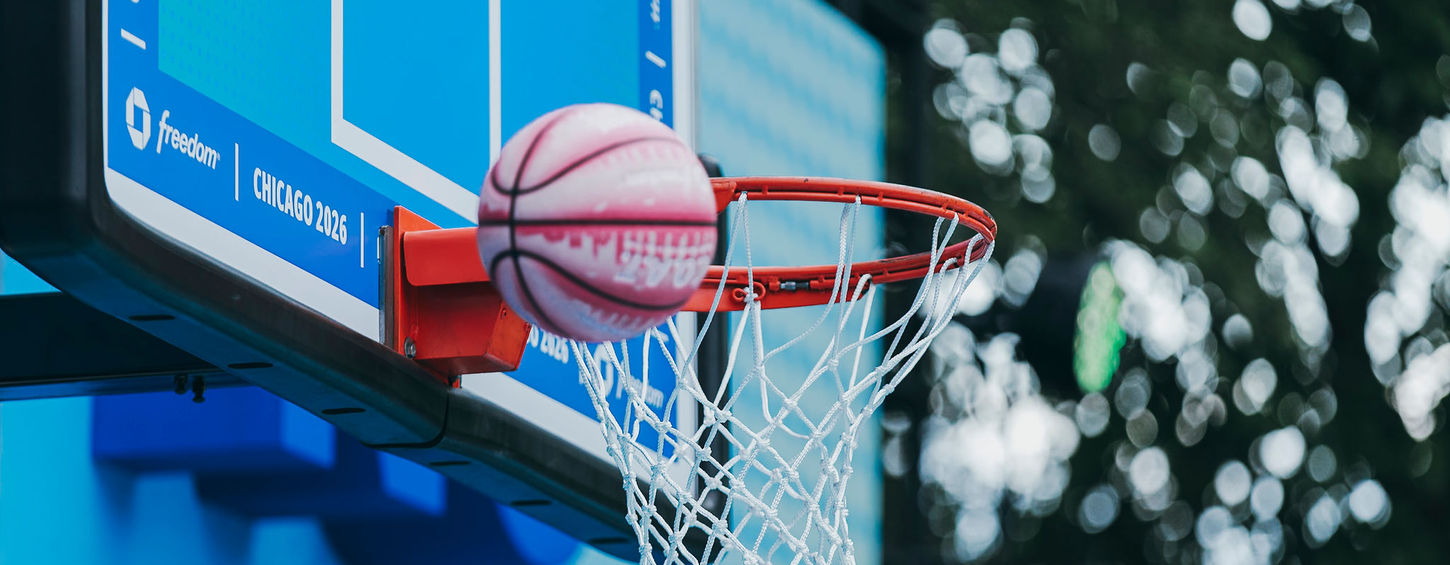 stage and court design for WNBA basketball activation with hero branding and messaging