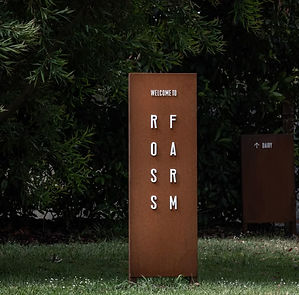 corten steel totem sign