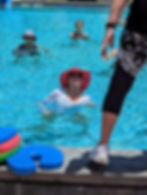 High angle view of a water aerobics instructor leading a class