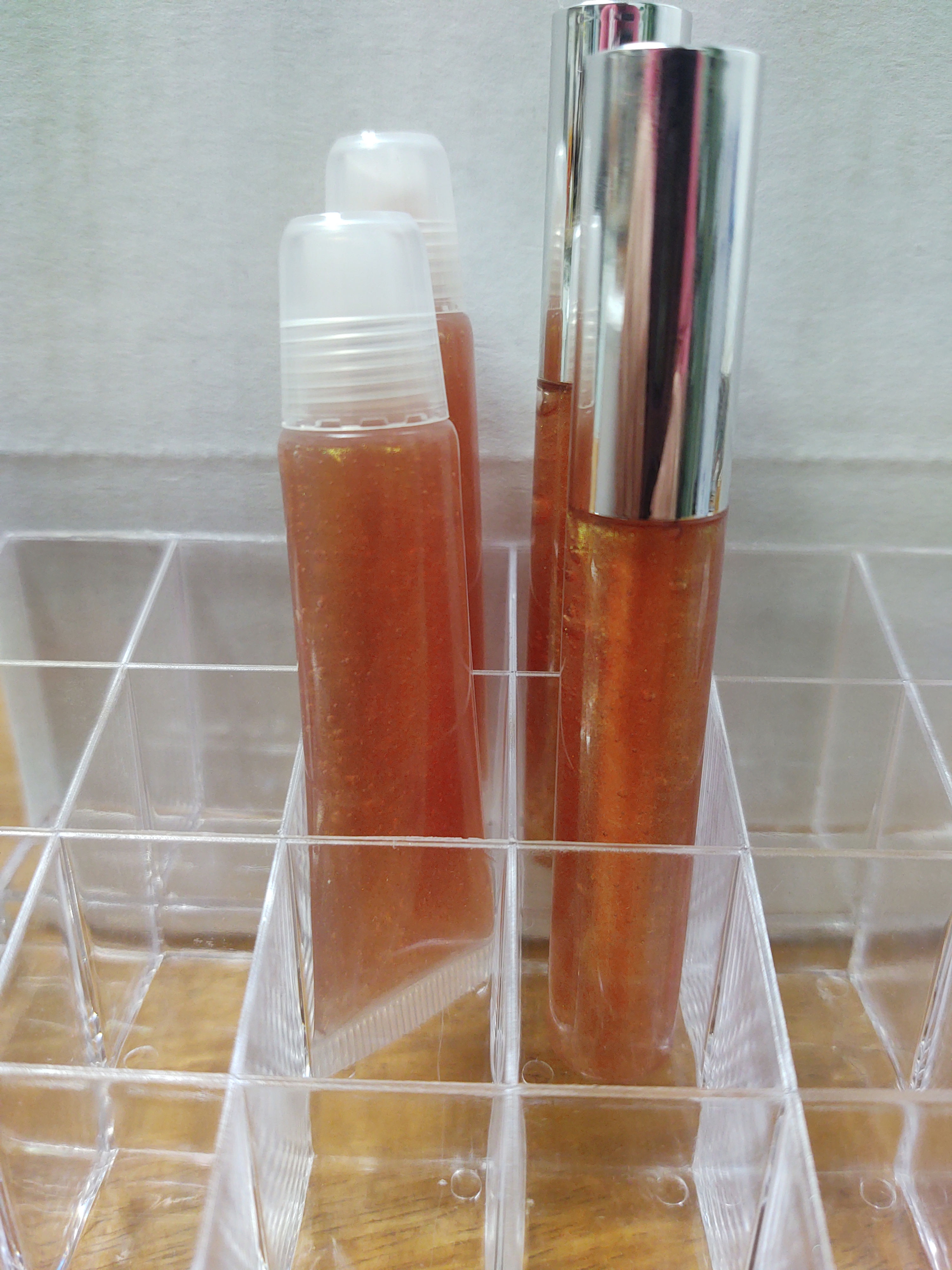 Lip Gloss- gold sparkle with slight color shift gold/green