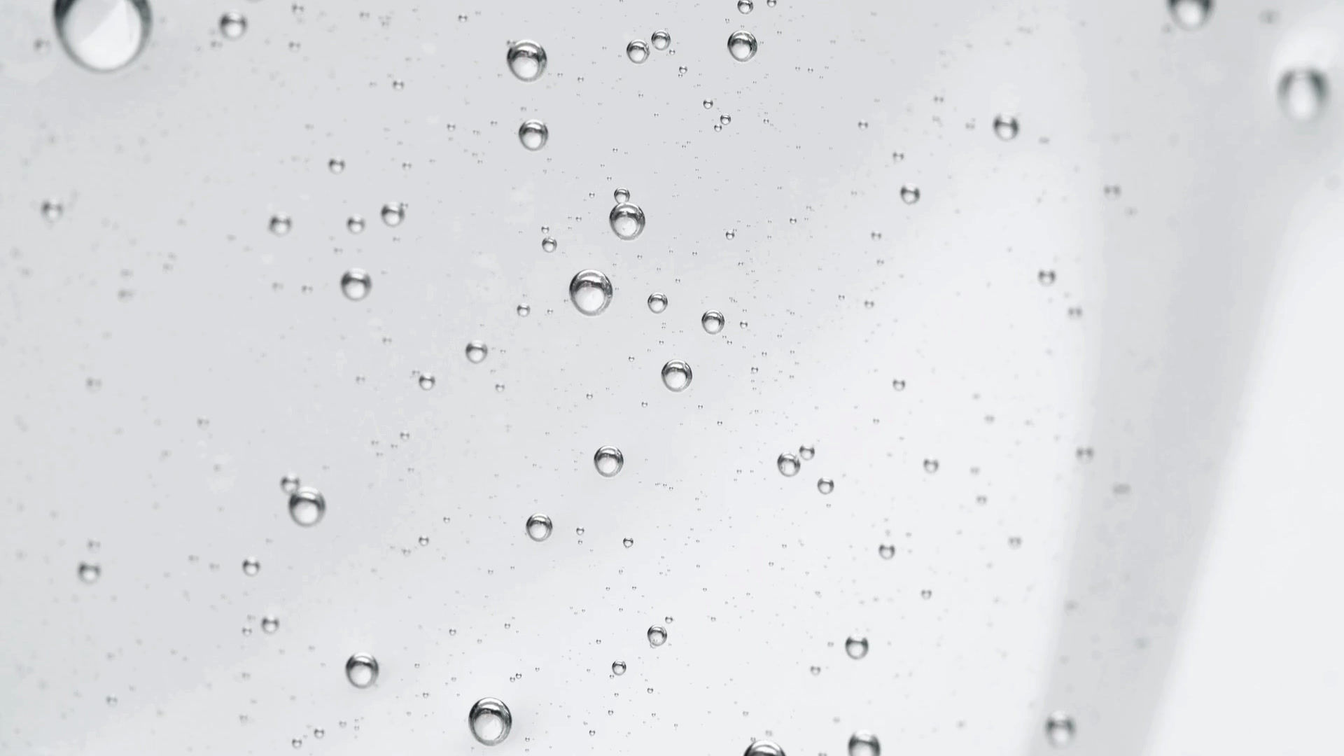 Close-up of clear hydrating gel texture with luminous air bubbles – Wild Alchemy Botanicals Revive & Glow Serum