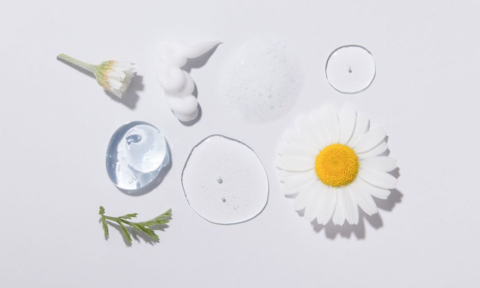 Chamomile flowers, leaves, and various skincare textures including gel, cream, foam, and serum drops, representing natural botanicals and scientific formulations in skincare