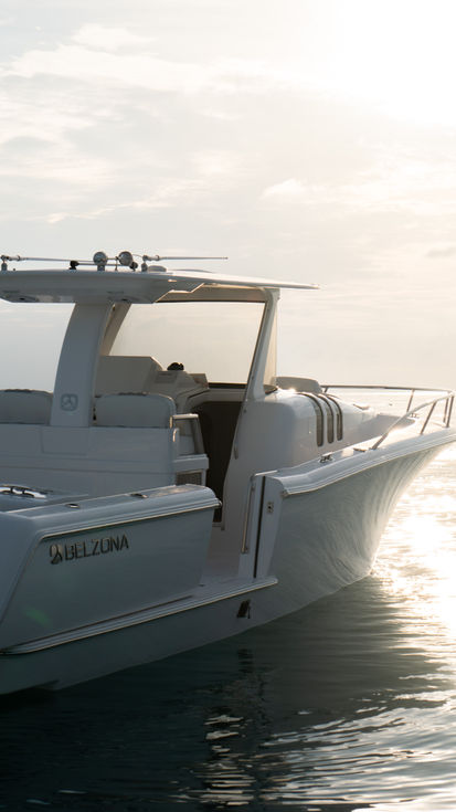 A Belzona Boat In The Sunrise With The Side Door Open