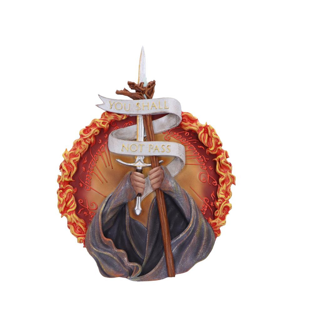 Transform your space into a fortress of fandom with our awe-inspiring Officially Licensed Lord of the Rings 'You Shall Not Pass' Wall Plaque. Crafted with exquisite attention to detail, this plaque brings the iconic scene to life, immortalizing the powerful words that resonated through the Mines of Moria. The finely sculpted design captures the essence of Gandalf's unwavering determination and the perilous journey of the Fellowship. Ready to mount on your wall, this plaque serves as a constant reminder of the epic battles fought in Middle-earth. Whether adorning your living room, study, or personal haven, let the spirit of Gandalf's valiant stand against the Balrog become a focal point of your decor.