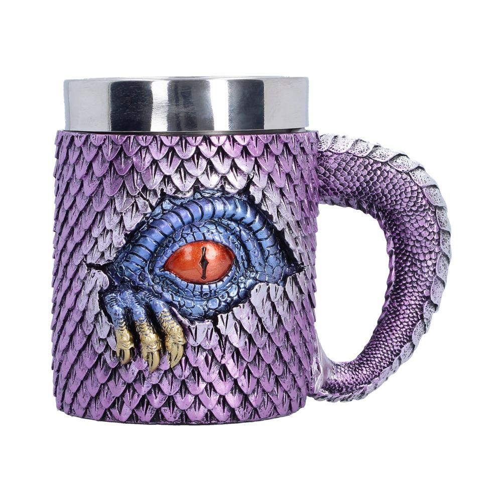 The Watchers Thirst Tankard is an originally designed collectible tankard, expertly cast in high-quality polyresin and hand-painted with care. Featuring shimmering purple and silver-scaled textures, a dark red dragon’s eye, and a claw emerging from the scales as if breaking free, it combines dramatic design with a removable stainless steel insert for practical use. Packaged securely to protect its intricate details, this tankard is perfect for fantasy enthusiasts, dragon collectors, and Gothic decor lovers. Bring a touch of mythical adventure to your home with this eye-catching, collectible drinkware piece.