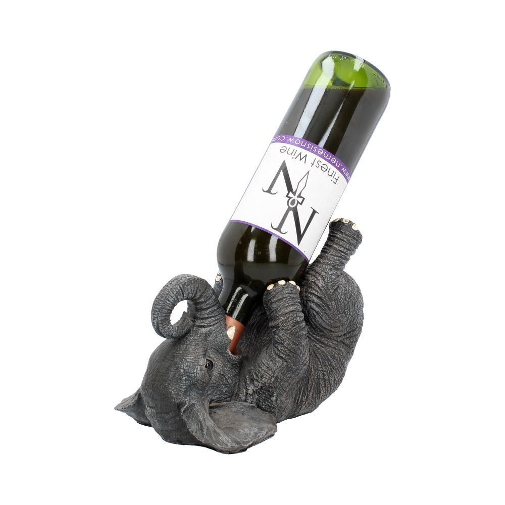 This playful pachyderm comes from alternative brand Nemesis Now's range of high-quality giftware. Lying comfortably on its back, this elephant's mouth is open wide enough to fit the neck of a wine bottle, trunk curling upwards in delight. Its feet are stretched upwards to support any bottle you place in it. Cast in the finest resin before being lovingly hand-painted, this elephant is the perfect gift for any lover of wine and wildlife.