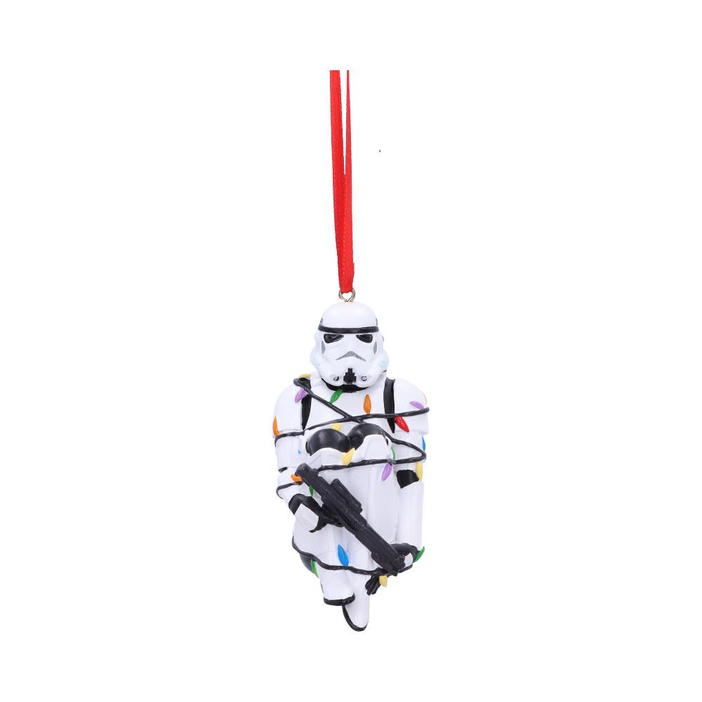 This mischievous Trooper seems to have got himself in a tangle. Bringing his knees to his chest and holding his blaster gun, he is wrapped up tightly in brightly coloured fairy lights. Cast in the finest resin before being expertly hand-painted, this is the perfect hanging ornament to add a touch of fun to any space. Known for their white suits and shocking aim, the Stormtrooper is easily noticeable by all!