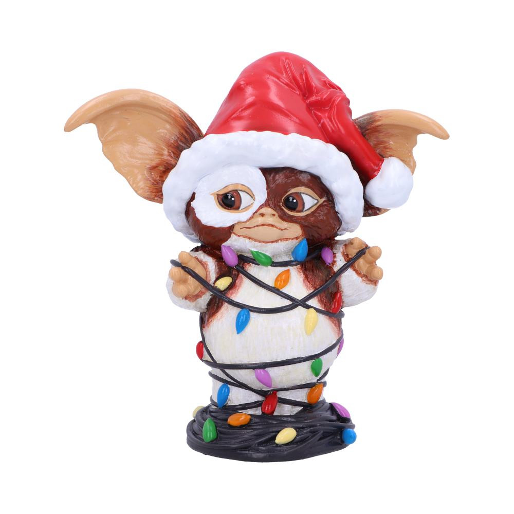 Here we see an innocent Gizmo tangled up in brightly coloured fairy lights, those mischievous Gremlins must've been playing games again! Ready to take up residence in a new home with a Santa hat placed on his head, this Gizmo is cast in the finest resin before being hand-painted and is guaranteed to become your most treasured festive figurine.
