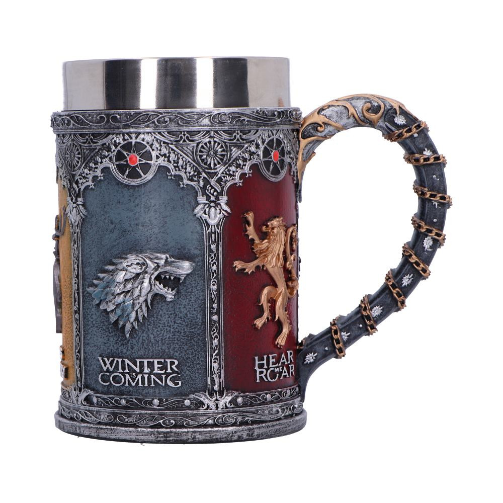 The Game of Thrones Sigil Tankard is a 14cm tall collectible mug that brings the world of Westeros to life. Featuring a stainless steel interior and a finely detailed resin exterior, it showcases the sigils and mottos of iconic Houses like Stark, Lannister, Targaryen, and Baratheon. Packaged in an officially licensed full colour display box. It’s perfect for gifting or collecting. Ideal for Game of Thrones fans, fantasy lovers, and pop culture enthusiasts, this tankard is a bold way to celebrate your favourite Houses with every sip.