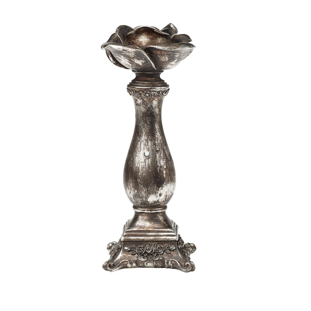 A beautiful black rose inspired candle stick. This candle stick will complete any fire place or dining table, or elegantly create a romantic ambience in any room.