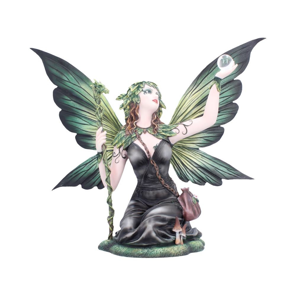Elaria is a gothic fairy figurine, capturing a moment of magical stillness as she kneels on a green, mushroom-covered base. With a nature-inspired design, she features black and green wings, a detailed brown satchel, a tree-like staff in one hand, and a raised glass orb in the other. Cast in high-quality resin and expertly hand-painted, every detail adds to her mystical charm. Beautifully packaged in a branded box, she’s perfect for collectors, fantasy lovers, or anyone drawn to gothic decor. Add a touch of dark enchantment to your space with this captivating fairy companion.