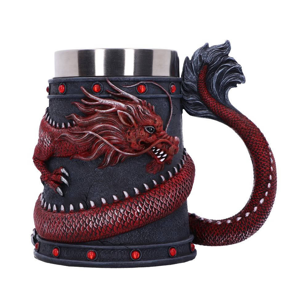 Drink deeply of a rich fantasy world with this enchanting Dragon Coil Tankard. Designed with a red onyx Dragon wrapped around the entirety of the tankard, jealously guarding the red jewels and your precious drink. From the side of the cup, the dragon's tail curls up, creating the handle and adding to the second to none detailing of the piece. With a removable stainless steel insert for ease of cleaning, this goblet makes a mysterious and enticing addition to any home.