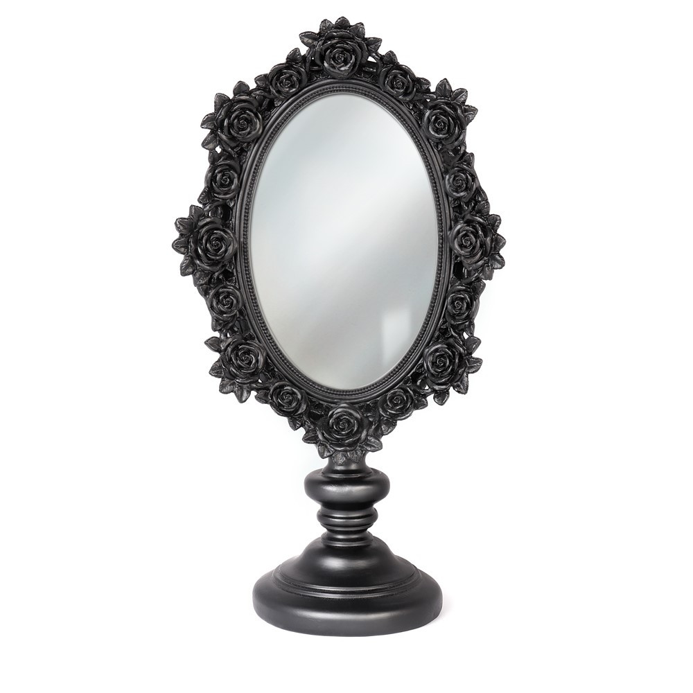 A beautiful addition to your boudoir and dressing table. Delicately decorated with black Rose detail this stunning mirror is perfect size for your morning make-up application. Oh what a delectable gift it would make for a loved one!