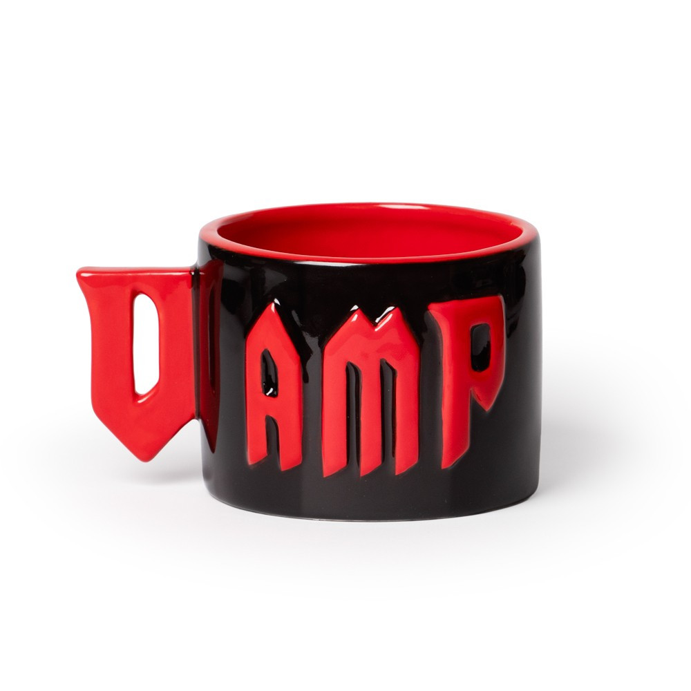 Dark, dramatic, and irresistibly stylish, the VAMP Statement Mug is hand-painted in glossy black with deep red lettering. Its sculpted letter handle creates a bold silhouette that's perfect for gothic kitchens, vampire lovers, or Halloween decor. Supplied in an Alchemy gift box, this mug is ideal for collectors of alternative homeware. A striking mug for vamp aesthetics and dark decor lovers. Features • Hand-painted black mug with red glazed letters • Sculpted letter-handle design • Capacity: 370ml / 13oz • Material: Glazed earthenware ceramic • Supplied in Alchemy branded gift box • Designed in England. Made in China. • Care: Hand wash only, not microwave safe • Forms part of the incredible Home & Gift collection by Alchemy