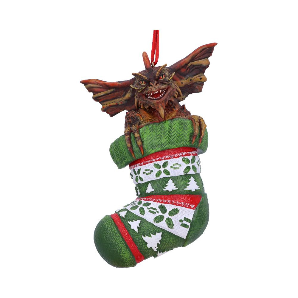 Gizmo and the Gremlins have taken Nemesis Now by storm! Here we see a mischievous Gremlin hanging in an ornate fairisle stocking, ready to cause havok in its new home! With a Santa hat placed on his head, this Gremlin is cast in the finest resin before being hand-painted and will become your most feared festive ornament.
