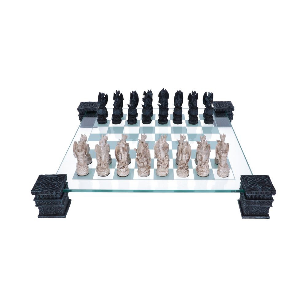 Exercise your brain and challenge your friends with this draconic chess set from alternative brand Nemesis Now's giftware collection. Held above the table by 4 black towers, each carved with ornate Viking-style knot designs, this glass chessboard has geometric knots and interlinking loops around the edges. On it, two armies of Dragons face each other - one white, one black. Ranging from hatchlings forming a row of pawns to the giant royal Dragons that rule the board, each magnificent piece is cast in high-quality resin and carefully hand-painted. A great gift for a Dragon-loving strategist, this chess set is a great way to challenge your Fantasy-loving friends to a battle of wits and strategy.