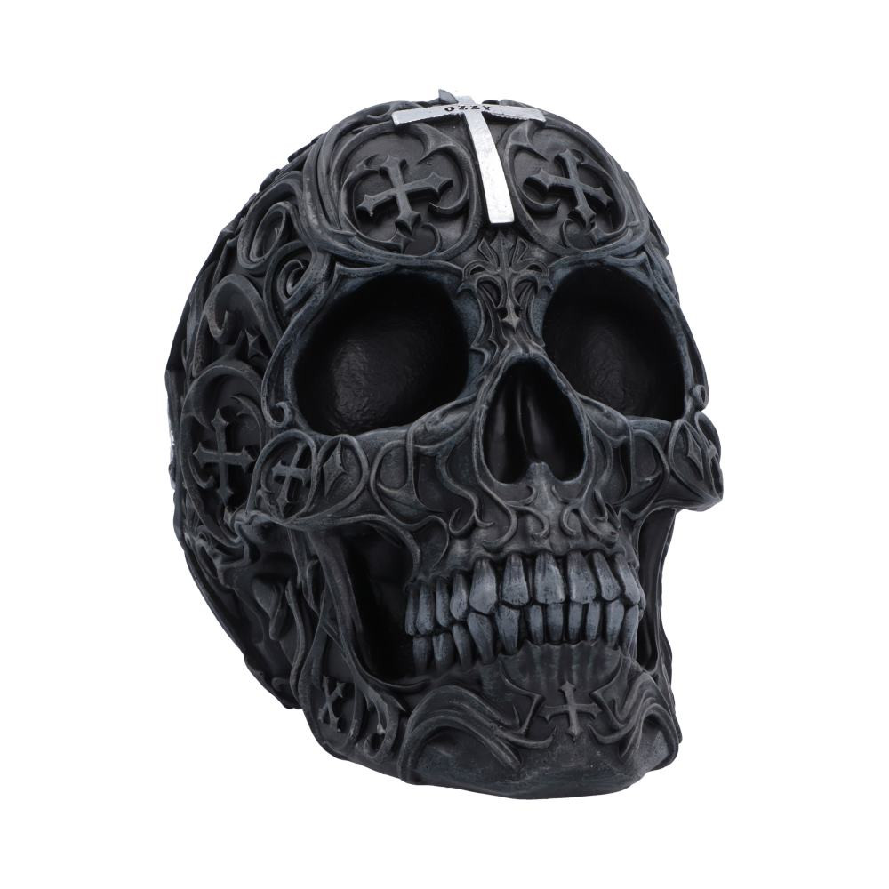 The Ozzy Osbourne Prince of Darkness skull is an officially licensed collectible from Nemesis Now, designed as a bold tribute to the legendary metal icon. Expertly hand-painted and cast in the finest resin, this 14.8cm gothic skull features intricate detailing across the surface, a silver cross on the forehead, and a silver vat emblem on the reverse with the words Prince of Darkness displayed above. Packaged in an officially licensed Ozzy Osbourne display box for safekeeping and presentation, this striking piece is ideal for Ozzy fans, heavy metal enthusiasts, and collectors of gothic memorabilia. Add a powerful touch of rock icon energy to your display with this standout decorative collectible.