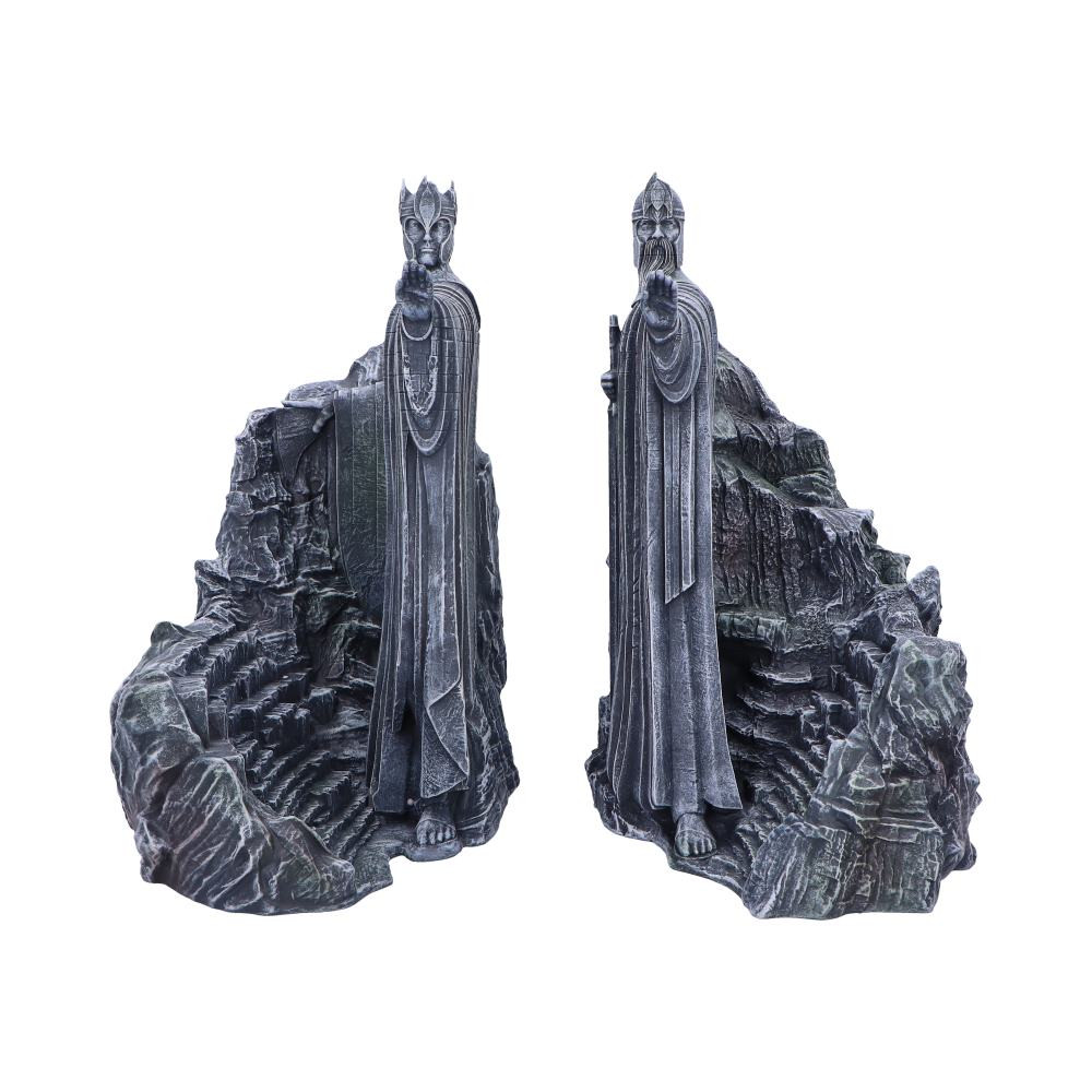 The Lord of the Rings Gates of Argonath Bookends are a striking set inspired by the towering stone sentinels from the beloved film trilogy. Crafted from durable, hand-painted resin, these bookends feature intricate detailing and a combined width of 37cm to securely hold your books or DVDs. Each set comes packaged in a premium branded collector’s box with protective foam, perfect for gifting or display. Ideal for Tolkien's fans, fantasy lovers, and movie memorabilia collectors, this is a must-have piece that brings the Kings of Gondor into your home.