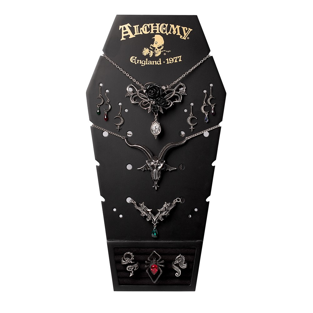 Showcase your favourite jewellery in gothic style with the Coffin Jewellery Display Board from Alchemy. Crafted from black painted MDF (front and back), this striking display features the iconic Alchemy logo and is designed with pierced holes to organise earrings, necklaces, bracelets, and rings. Practical and versatile, the board includes iron hooks and hinges for wall mounting, as well as a fold-out stand for free-standing use. The polyester ring display section offers an elegant way to present your most treasured Alchemy rings. • Shape & Finish: Coffin-shaped, black painted MDF • Fittings: Iron hook and hinge for wall or tabletop display • Jewellery Storage: Pierced holes for earrings, necklaces & bracelets + polyester ring display • Branding: Features the iconic Alchemy logo • Packaging: Each piece carefully packed in a bubble bag. A unique decorative display for personal use, or an eye-catching piece for retail and jewellery presentation.