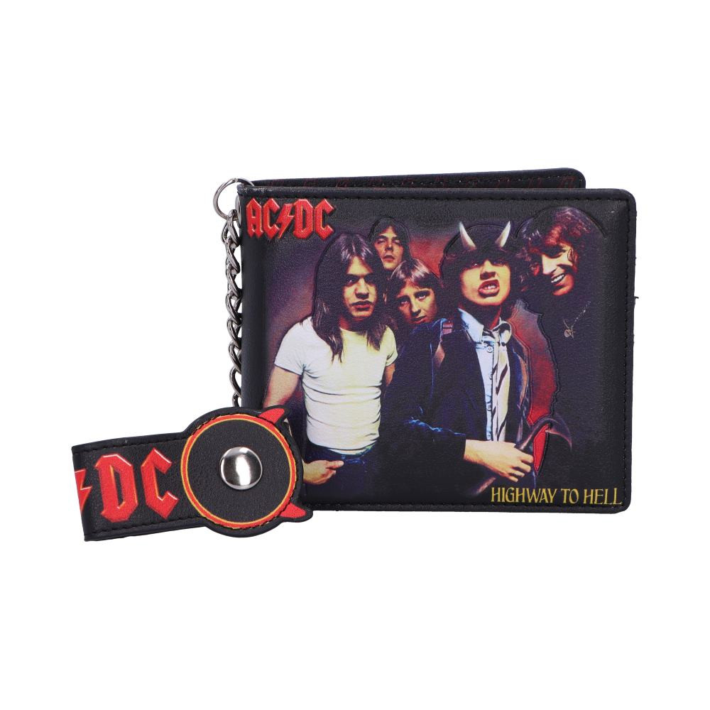 Unleash the Rock 'n' Roll rebellion with this Officially Licensed AC/DC Highway to Hell Wallet. Paying homage to one of the greatest rock albums ever created - an album that's become an anthem for the wild, free and untamed. Featuring the instantly recognisable 'Highway to Hell' album cover. Providing ample space for your cards and cash, ensuring you can keep your financial affairs in order with style and ease. A must-have fashion accessory for any AC/DC fan.