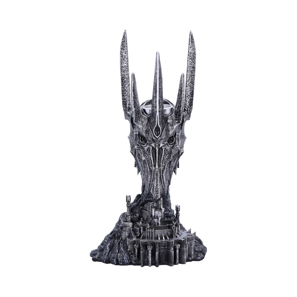 Introducing this Officially Licensed Lord of the Rings Sauron™ Tea Light Holder. Unleash the power of darkness in your home and step into the mystical world of Middle-Earth ™ with this tea light holder. Inspired by the iconic fantasy saga, this intricately designed tea light holder brings an aura of dark allure to any space it graces. The holder is cast in the finest resin with a small metal insert at the top to hold the tea light. Whether you're a Lord of the Rings collector or enjoy fantasy themed decor, this Sauron™ Tea Light Holder is a must-have addition in your space.
