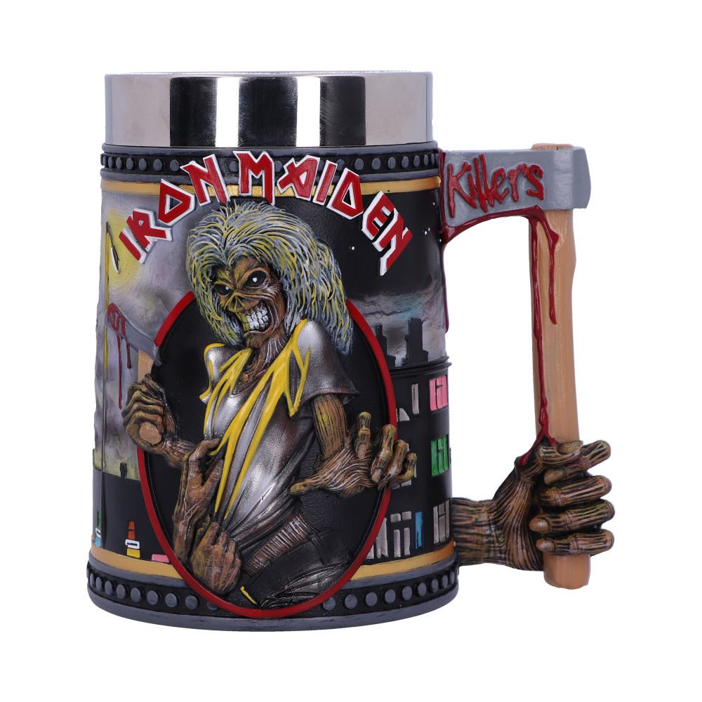 Show your allegiance to the Monsters of Rock with this electrifying and officially licensed Iron Maiden Killers tankard, created by Nemesis Now. The zombie-like mascot stares forward with piercing eyes, intimidating all those that pass by. He stands with a bloody axe in his right hand as his left points towards the viewer. A victim grasps at his shirt, presumably taking his last breath...The Handle is formed from Eddie's hand clinging onto a bloodied axe. Cast in high-quality resin before being carefully hand-painted, this ideal piece of rock memorabilia will bring terror and excitement to any Maiden fan's soul and has a stainless steel insert for ease of cleaning!